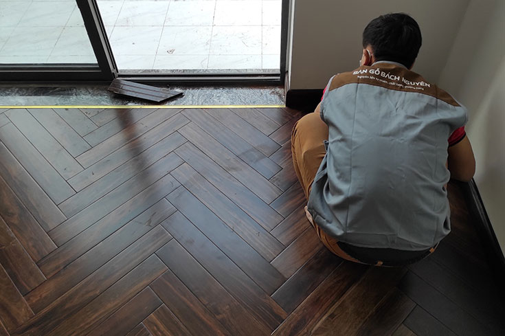 Hoàn thiện dự án lát sàn gỗ Chiu Liu Lào xương cá tại Vinhome Gadenia Mỹ Đình